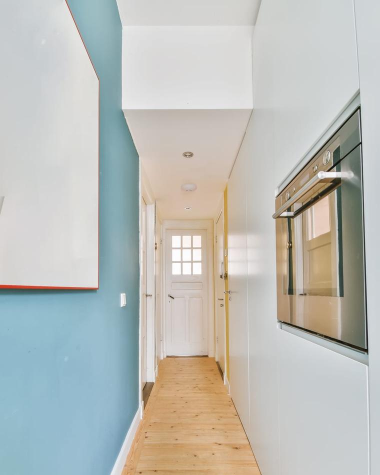 Freshly painted apartment building corridor with clean white walls